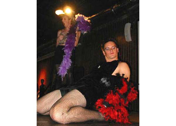 Men dressed as women at a Jesuit drag show